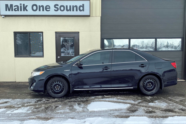 Toyota 2012 Camry Hybrid with professional window tint in North Bay